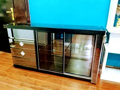Black glass display cabinet with sliding doors - good condition
