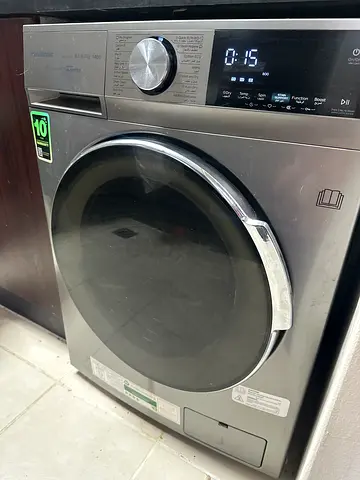 Front load washer/dryer combo (10 kg) in good working condition.