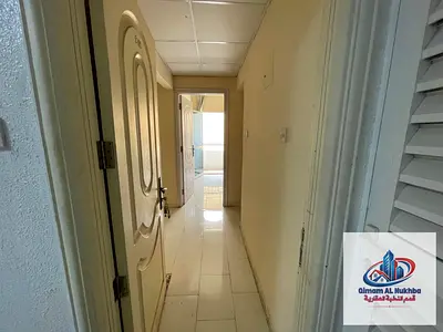 Beautiful two-bedroom apartment with a living room for annual rent in Al Naba'a area, Sharjah - spacious and comfortable - stunning view - central air