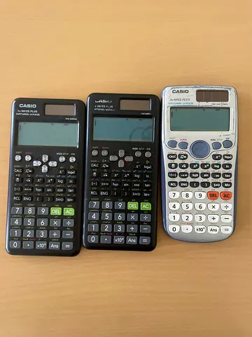 Three scientific calculators (Casio) - used