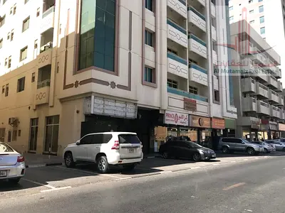 شقة غرفتين وصالة للإيجار السنوي في البستان – موقع مميز قريب من دبي والشارقة بسعر 33,000 درهم