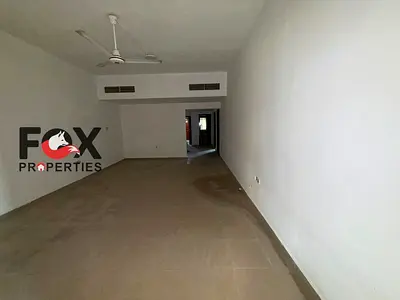 One bedroom and living room for annual rent in Ajman, Al Rashidiya 1 area, Horizon Towers. 2 bathrooms, balcony. Payment in 4 installments.