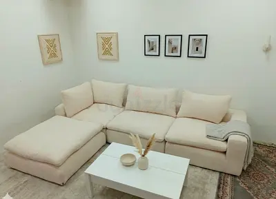 Beige color marina home modular sofa with ottoman