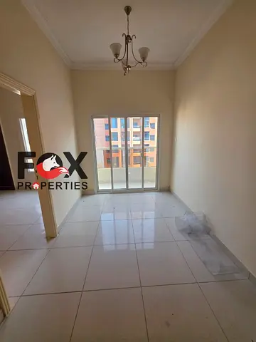 Spacious 1-bedroom master apartment with balcony and open view; prime central Ajman location near all services, with easy payment plans.