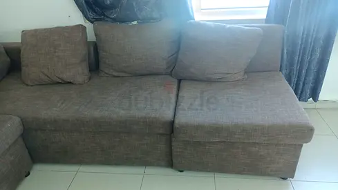 Used L-shaped fabric sofa with chaise - neutral grey, good condition