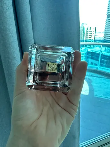 Used womens perfume bottle (partially full) - elegant square glass bottle