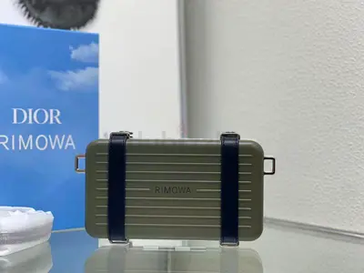 Dior and Rimowa personal bag