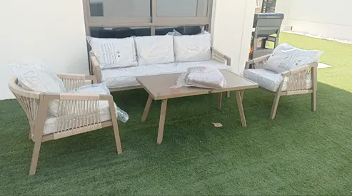 4-piece outdoor lounge set with coffee table — light wood finish, like new