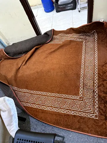 Brown rectangular wool-look carpet