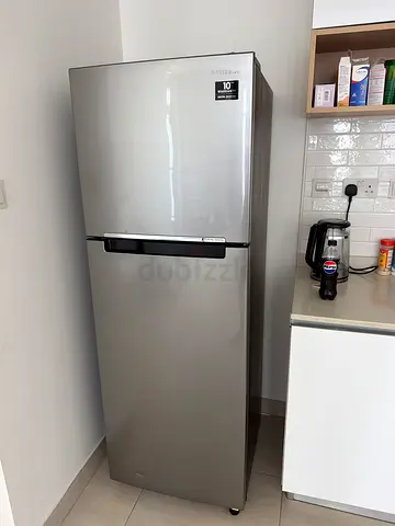 Silver top-freezer refrigerator - good condition, 2 doors