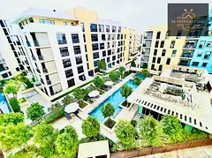 Refined 1-Bedroom Apartment with Contemporary L-Shaped Kitchen | Full Amenities | Uptown Al Zahia