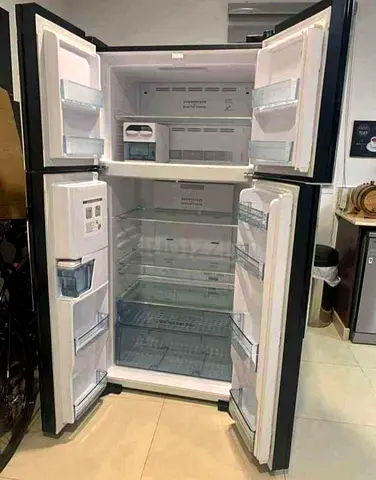 Spacious Double-Door Refrigerator (Top Freezer) - Good Working Condition