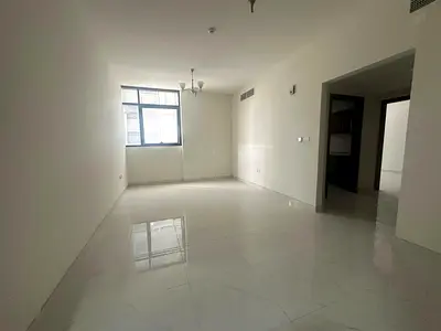 The most luxurious one-bedroom apartment in Al Taawun, Sharjah. Features include a master bedroom, two bathrooms, an open view, and is the second occu