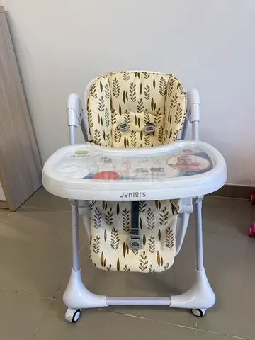 Compact baby high chair with tray — gently used