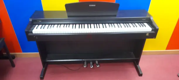 Yamaha Upright Piano for sale in good condition.  All keys working perfect