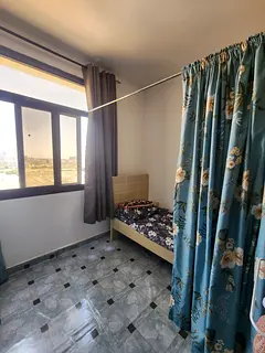 Bedspace with privacy curtains for working executive ladies with valid visa/ EID..