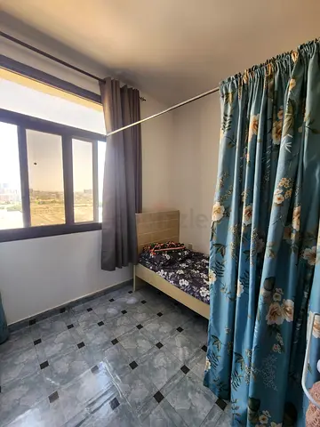 Bedspace with privacy curtains for working executive ladies with valid visa/ EID..