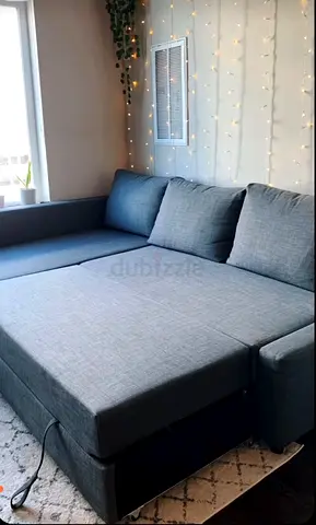 Grey L-shaped Sofa Bed with Storage - Good Condition