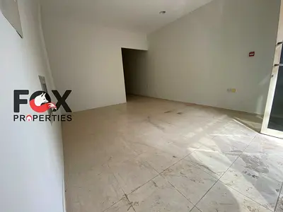 The largest commercial shop in Mezan for annual rent in the Al-Aaliah area, suitable for all commercial activities, area 1300 sq ft, separate kitchen