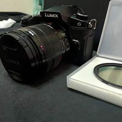 Panasonic Lumix G85 Mirrorless Camera with Lens + Filter