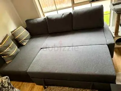 Grey L-shaped Sofa Bed with Storage - Good Condition
