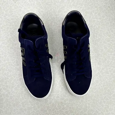 Navy blue DKNY sneakers.