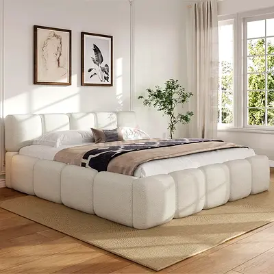 Boucle upholstered generously padded super king bed frame