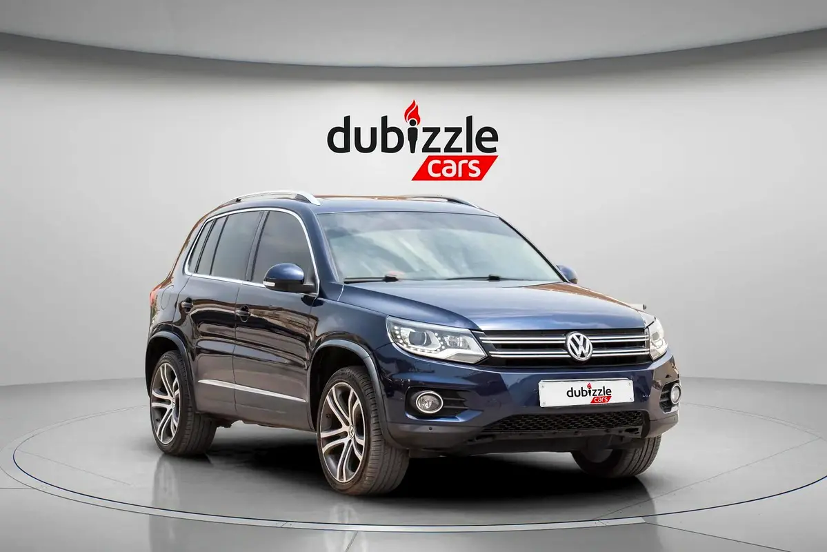 Volkswagen Tiguan 2015 — photo 1 of 15