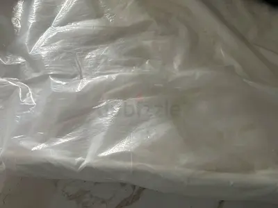 Queen-size mattress in good condition (wrapped)