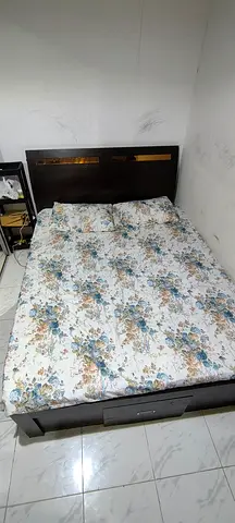 Double bed frame with headboard and under-bed drawer - dark wood
