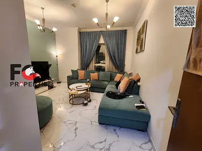 Investment opportunity: One bedroom and living room for sale in Al Waha Towers, furnished, spacious with balcony and parking inside the tower, at a ve