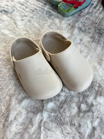 Beige toddler clogs, gently used