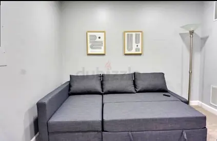 Grey Convertible Sofa Bed with Storage - Good Condition