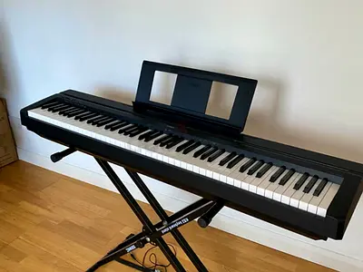 Yamaha P-45 new digital piano with a stand