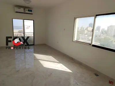 Two-bedroom apartment with a living room on Ajman Corniche for annual rent + 2 balconies with sea views.