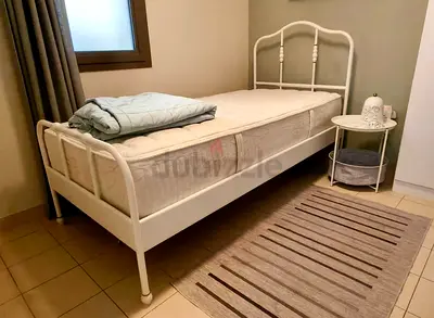 Single white metal bed frame with mattress — great condition