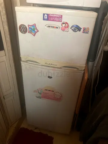 Small white refrigerator with top freezer - used, good for single room