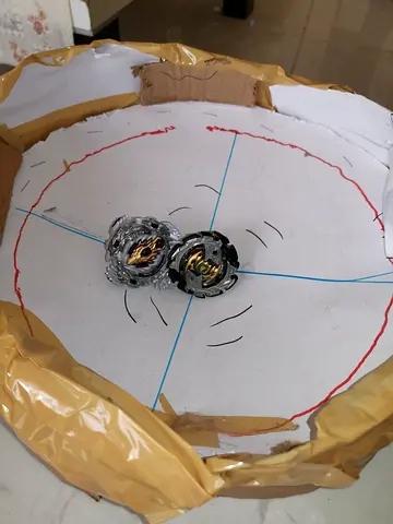 Pair of Beyblade Burst Tops with DIY Cardboard Beystadium - Used