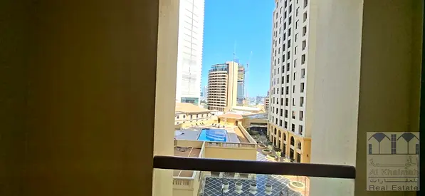 Spacious Unfurnished Studio | Partial Sea & Pool View