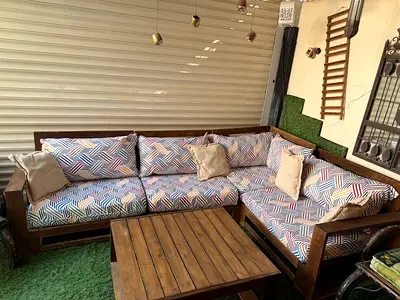 Wooden L-shaped Outdoor Sofa Set with Cushions and Coffee Table