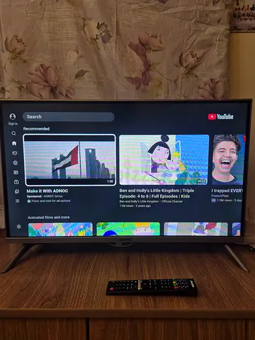 32-inch LED TV in good working condition with stand and remote