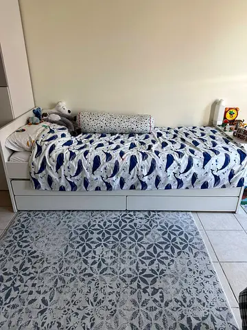 Ikea single bed with mattress underneath bed and storage drawers available in perfect