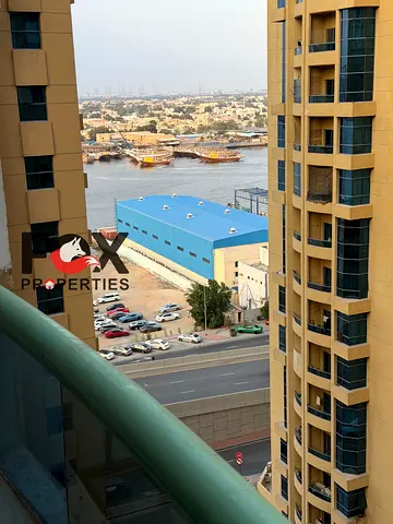 Apartment for sale at a bargain price below market in a prime central location next to Clock Tower, close to all services with easy access to Dubai an