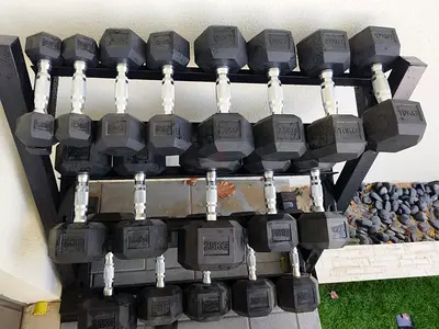 Hex Dumbell set and rack 2.5kg to 20kg.