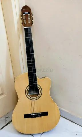 Classical acoustic-electric cutaway guitar - natural finish, good condition