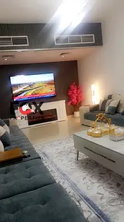 Own the largest two-bedroom apartment with a living room in Ajman | Open view | Private parking | Fr
