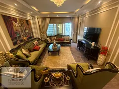 Apartment for sale in Al Majaz 3 area, overlooking Al Qasba Canal, with an open view.