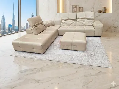 Almost like new condition Natuzzi L shape Leather sofa with footstool