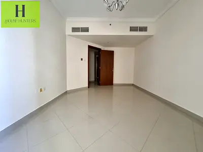 LAVISH 1BHK WITH BALCONY +GYM -SWIMMING POOL FREE -KIDS PLAYING AERA FREE EASY EXIT TO DUBAI