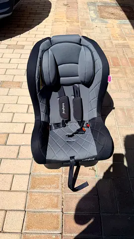 Babyhug car seat . Like new.